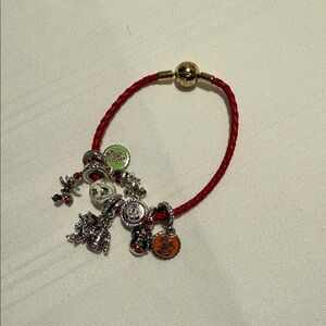 Pandora Red Bracelet with Silver and Gold Charms